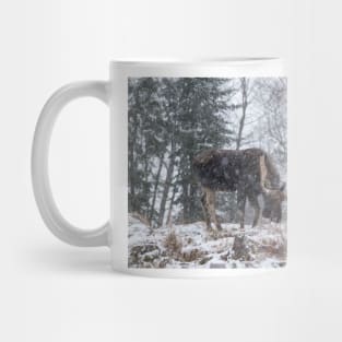 Moose in a snow storm Mug